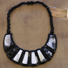 Load image into Gallery viewer, Horn Jewelry Bridge Necklace - on wood background
